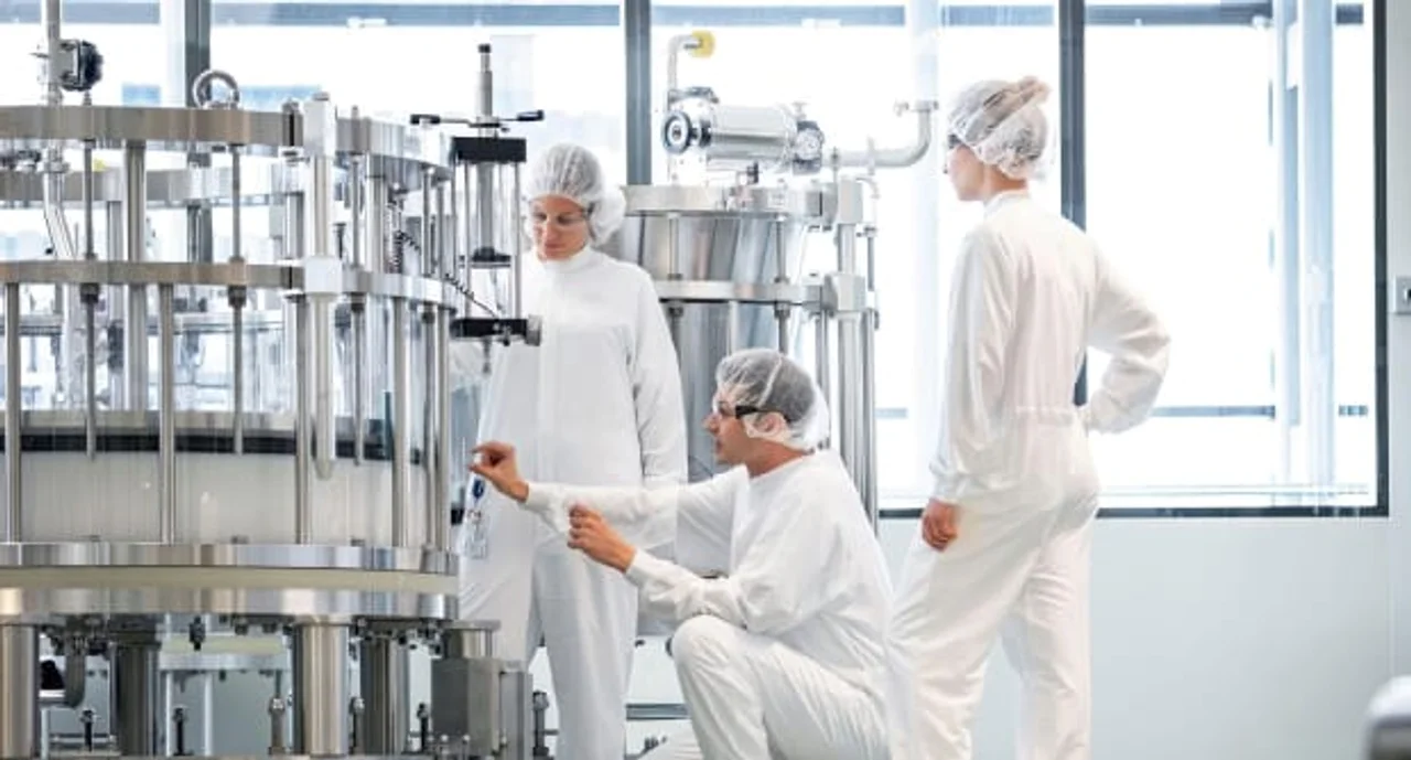 Lab workers checking lab equipment