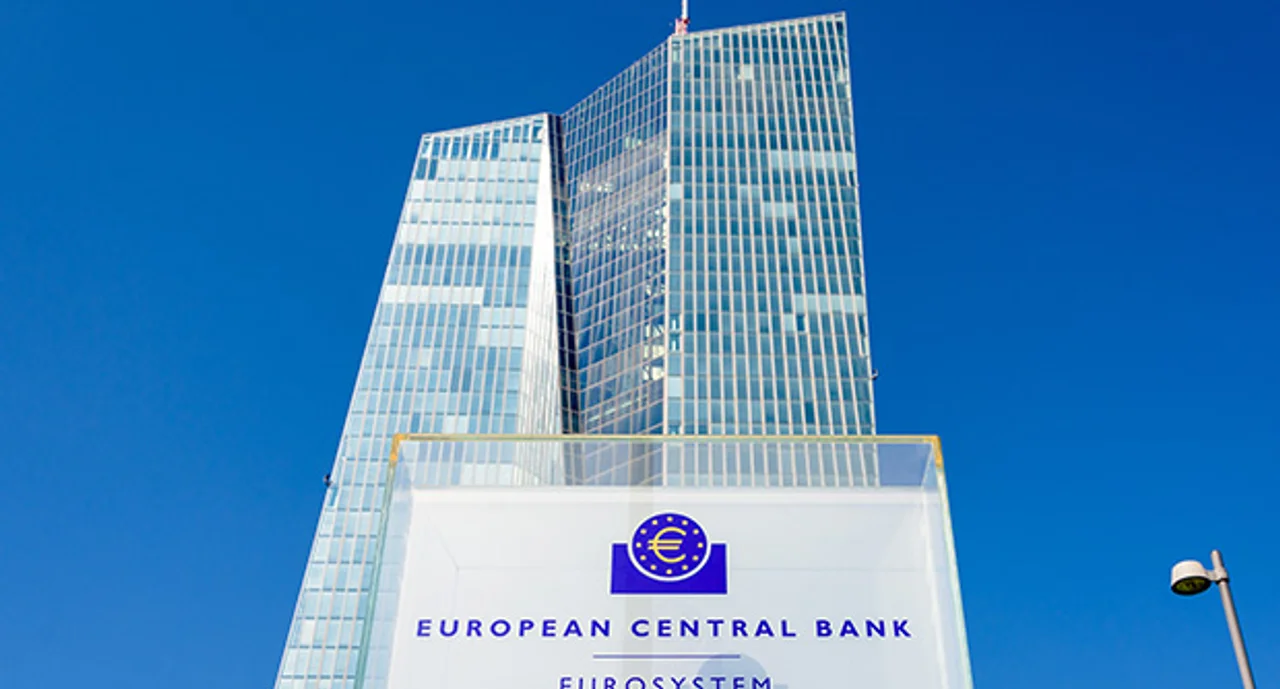 Low angle view of the sign and logo of the European Central Bank at the southern entrance of the Skytower building, headquarters of the ECB since 2015.