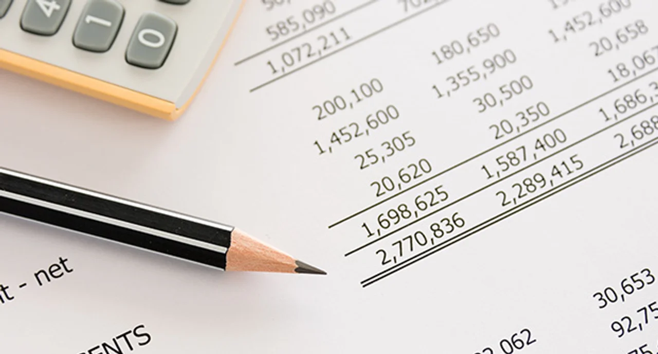 Pencil on an accounting ledger