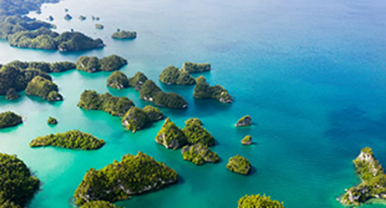 Green islands in the light blue sea