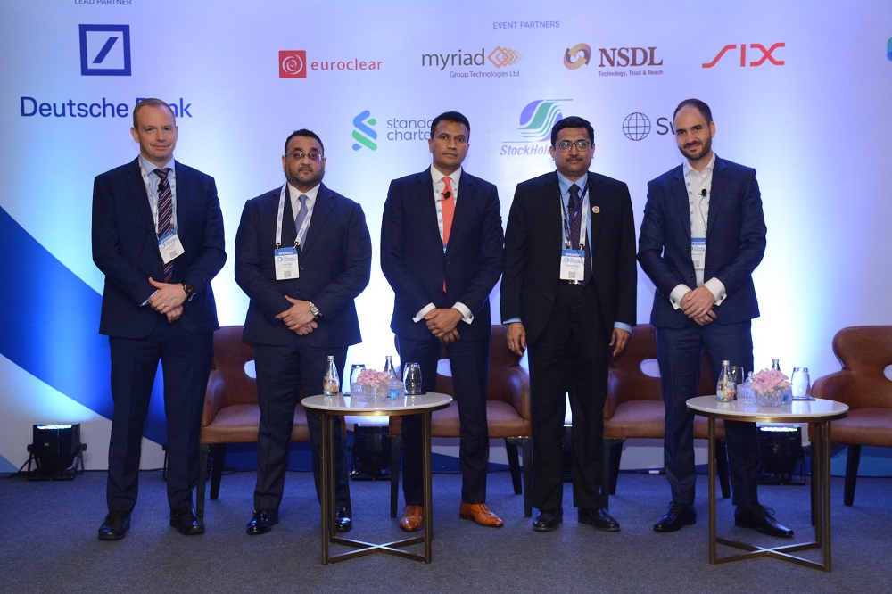 Panellists Daniel Smith, J.P. Morgan, Janak Dalal, Deutsche Bank; Kiran Shetty, Swift; Prashant Vagal, NSDL, and Lukas Conrad, SIX